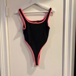 Black with neon pink trim bodysuit